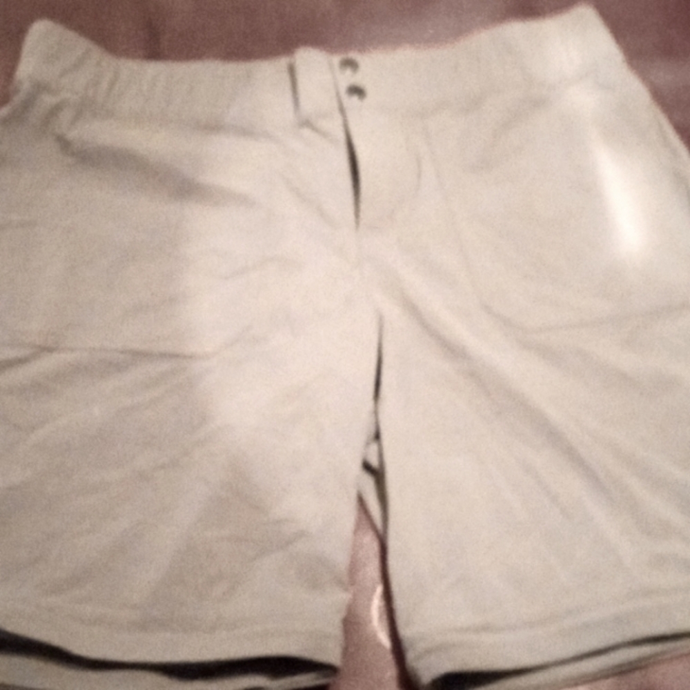 Columbia shorts/pants. Legs can zip right on or off. Sz. LG Khaki color